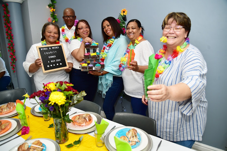 Glenda Thorne, right, hosted a denim and white party at her sister’s home in Rowallan Park on November 4. With her here are, from left, Rene Ludick, Daniel Black, Ellen Weideman, Antoinette Baatjes and Mary Louw