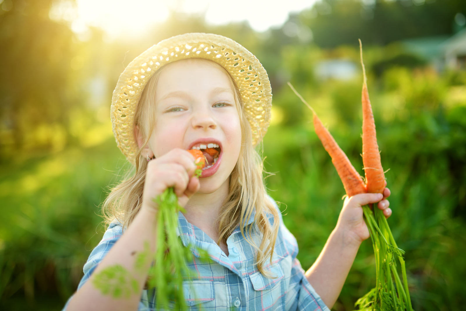 girl eating carrots