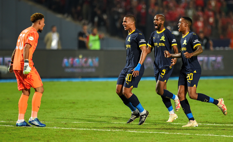 Mamelodi Sundowns goalkeeper Ronwen Williams (left) celebrates victory with his teammates after their African Football League 2023 semifinal second leg match against Al Ahly at Cairo International Stadium in Egypt on Wednesday.