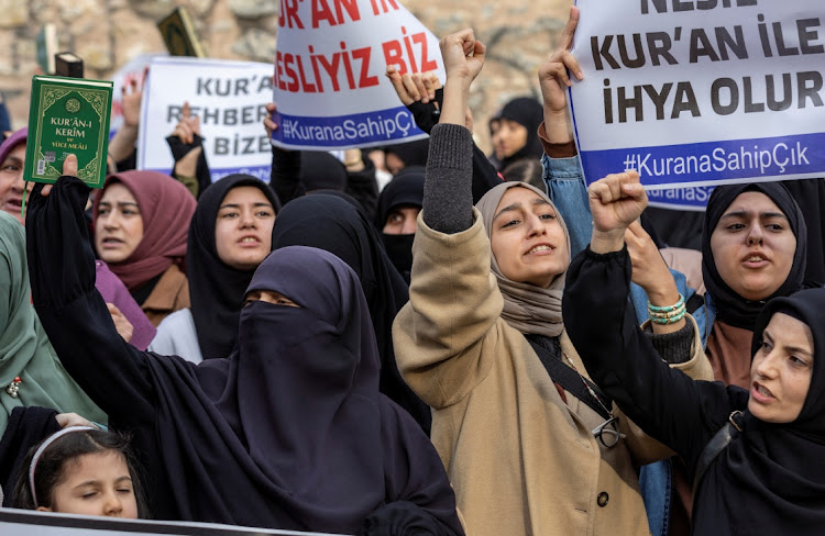 Protesters shout slogans as they demonstrate in front of the consulate general of Sweden after Rasmus Paludan, leader of Danish far-right political party Hard Line, burned a copy of the Koran near the Turkish embassy in Stockholm, in Istanbul, Turkey, January 22 2023. Picture: UMIT BEKTAS/REUTERS