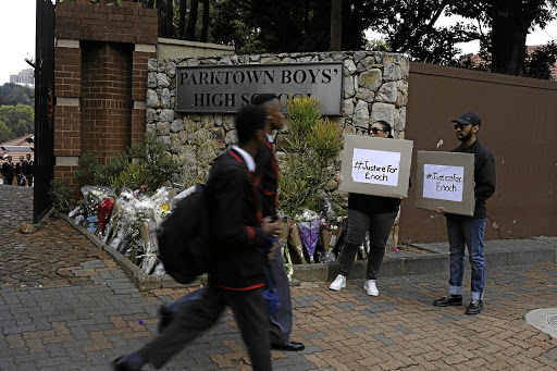 A small picket takes place outside Parktown Boys' High School. Classes resumed on Tuesday morning following a day of counselling on Monday for those affected by the death of pupil Enoch Mpianzi./ ALON SKUY