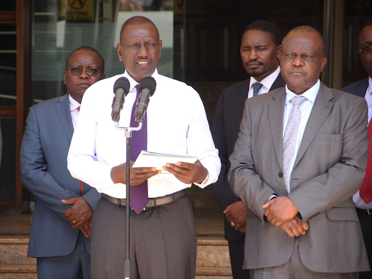 Deputy President William Ruto with NDMA CEO James Oduor during the drought crisis press conference outside Harambee House office on March 18, 2019.