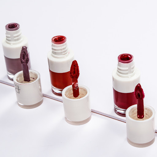 Title 2, Small White Bottle Matte Lip Gloss that Doesnt...