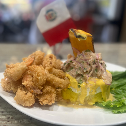 Causa Acevichada con Chicharron de Mariscos