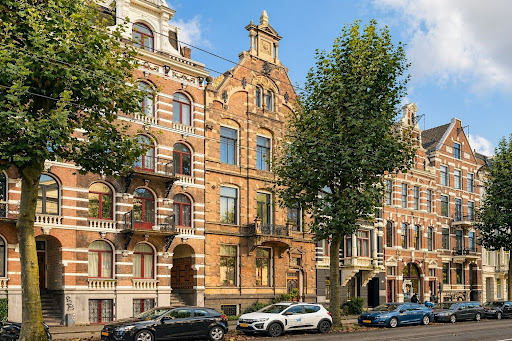 Old building facades with balconies in this luxury house for sale in Amsterdam ($3,489,549 - 446 m²)