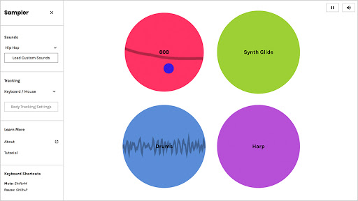 Screencap of Sampler interface. The left hand menu contains a variety of presets and controls. In the main play area, two of four colorful circles have soundwaves mapped over them.