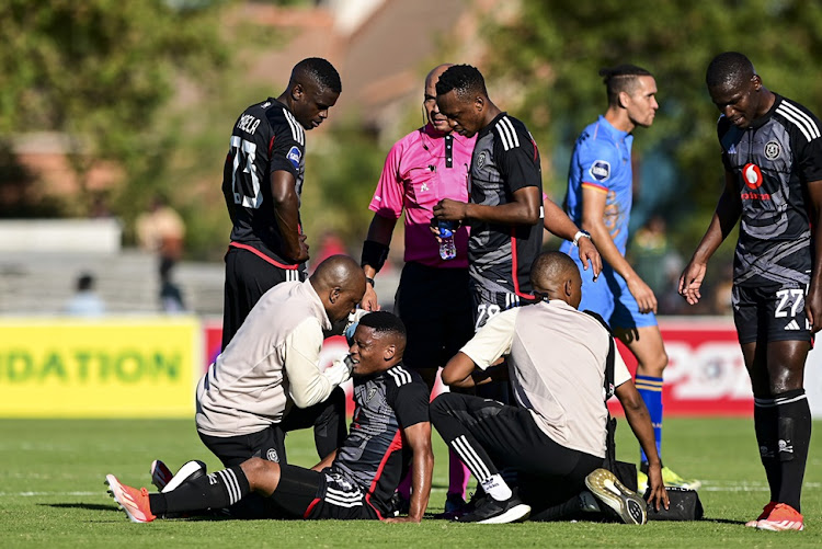 Thabiso Lebitso of Orlando Pirates is treated for an injury in their DStv Premiership match against Royal AM at Harry Gwala Stadium in Pietermaritzburg on Sunday.