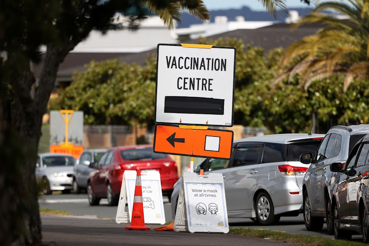 A vaccination centre sign directs the public during a lockdown to curb the spread of a coronavirus disease (Covid-19) outbreak in Auckland, New Zealand, August 26, 2021.