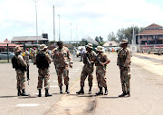 SANDF soldiers receiving instructions from an officer. File image