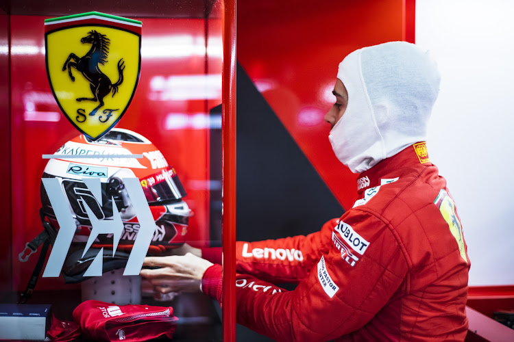 Charles Leclerc kitting up for another test session