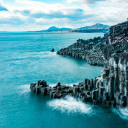 Blue Sea and High Cliffs
