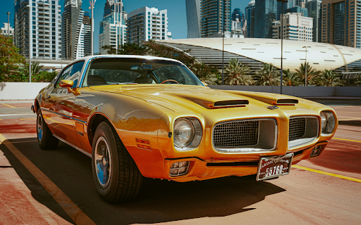 Yellow Pontiac Car Parked on Parking Lot screenshot 1