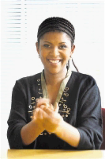 HAND CARE: Sindy Mabe tests hand creams on her beautuful hands. Pic. Thys Dullaart. 28/10/2008. © Unknown