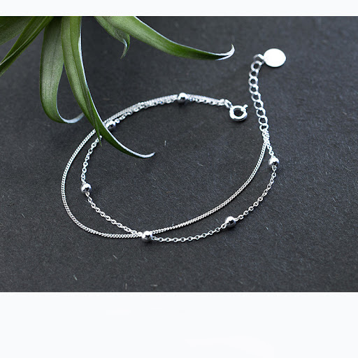 Title 2, Girl Students Double Glitter Bead Bracelet. A ...