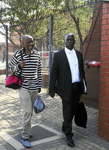 Welcome Msomi and his lawyer Benito Mangoleleat the Palm Ridge magistrate's court./Veli Nhlapo