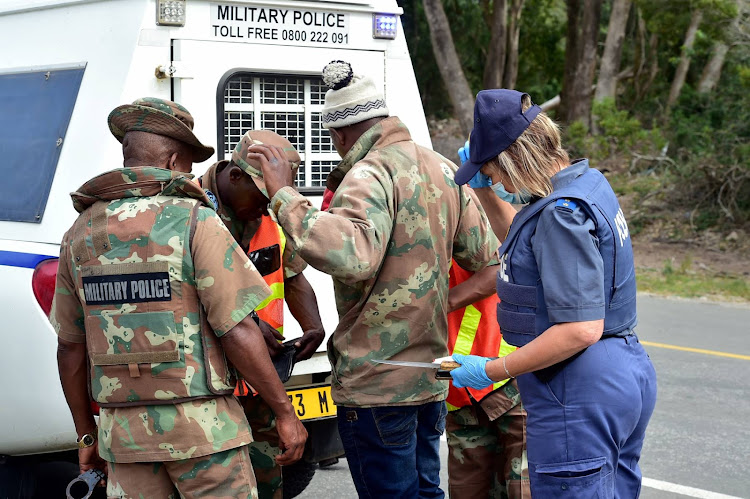 Police and SANDF soldiers were out in force on Saturday April 11 clamping down on residents from Walmer township who did not abide by the lockdown regulations. A man was detained for carrying and knife and wearing a SANDF uniform top