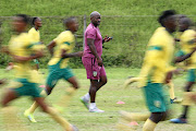 Arrows coach Steve Komphela taking his players through the paces ahead of  Bloem trip. / Anesh Debiky / Gallo Images