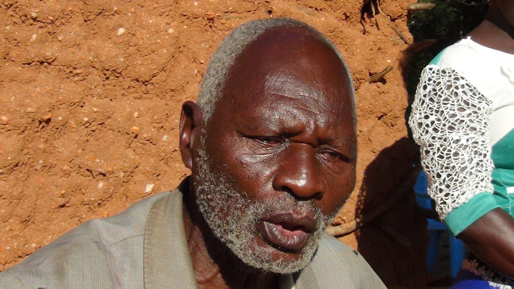 Mwendwa Nguva, the father to Muluki Mwendwa, speaks to the media at their Mutanda Village home in Mumoni subcounty, Kitui on Tuesday