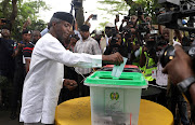 FILE PHOTO: Vice President Yemi Osinbajo casts his vote at the Victoria Garden City in Lagos, Nigeria February 23, 2019. 