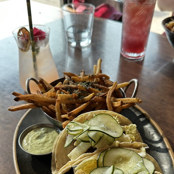 Pork belly tacos and rosemary french fries, with the "No Shrubs" mocktail