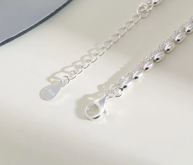 S925 zilveren bonen ster dubbellaagse armband persoonlijkheid, stijlvolle armband voor dames, perfect voor een opvallende look.