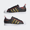 superstar core black / gold metallic / scarlet