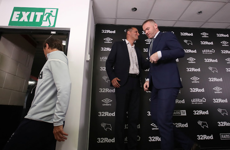 Derby County's Wayne Rooney leaves after the press conference