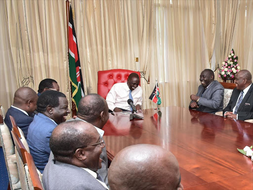 Deputy President William Ruto shares a light moment with Kisii and Nyamira leaders at his Karen residence on May 4,2017./DPPS