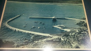 A historic photo from 1928 shows the beach when the harbour was first built 
