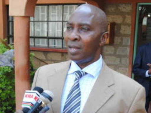 Narok County Commissioner Moffat Kangi addresses journalists outside his office yesterday