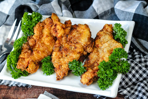 A platter of Just Plain Good Golden Fried Chicken Cutlets.