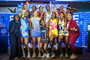 Netball SA president Cecilia Molokoane, far right, poses with players at yesterday's launch of the Telkom Netball League.