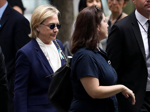 Democratic presidental nominee former Secretary of State Hillary Clinton arrives with an unidentified woman at the September 11 Commemoration Ceremony at the National September 11 Memorial & Museum on September 11, 2016 in New York City. Hillary Clinton left a September 11 Commemoration Ceremony early after feeling overheated and went to her daughter's house to rest. Picture Credit: Justin Sullivan/Getty Images/