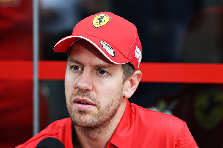 Sebastian Vettel of Germany and Ferrari dismissed Max Verstappen's suggestions that Ferrari had an unfair advantage with their engine.