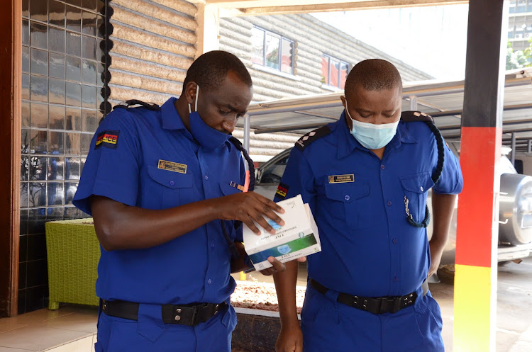 Kenya Police inspector David Murai and chief inspector Joseph Ndirangu