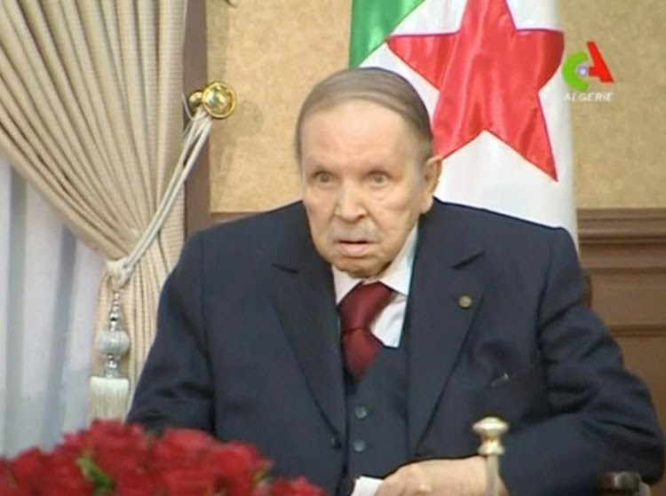 Algeria's President Abdelaziz Bouteflika looks on during a meeting with army Chief of Staff Lieutenant General Gaid Salah in Algiers, Algeria, in this handout still image taken from a TV footage released on March 11, 2019.