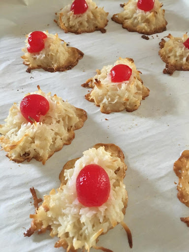 Macaroons right out of the oven.  Be sure and use parchment paper as the cookies are sticky and this makes clean-up easy.