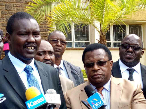 Uasin Gishu Governor Jackson Mandago with National Police Service Commission chairman Johnston Kavuludi address the press in Eldoret, March 12, 2018. /MATHEWS NDANYI