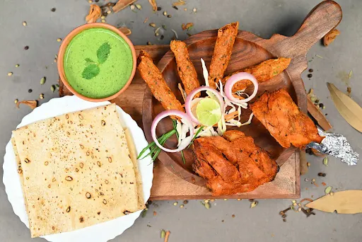 2 Piece Tandoori Chicken + 1/2 Mutton Seekh Kebab + 2 Rumali Roti