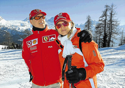 Formula One legend Michael Schumacher with his wife, Corinna, in Italy in 2003