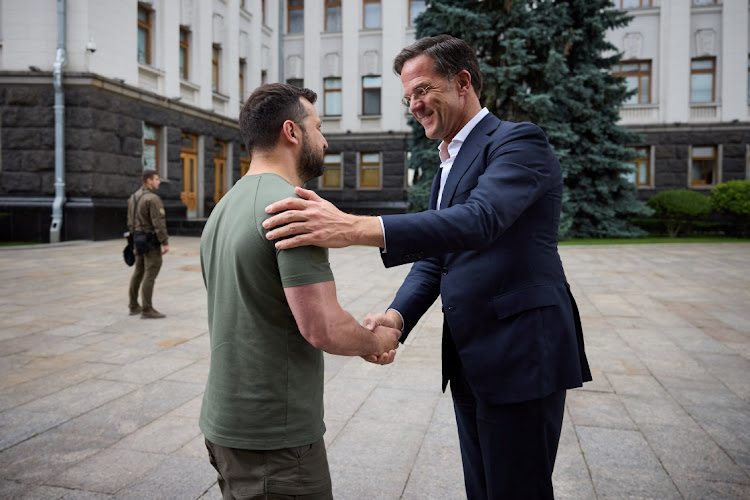 Ukraine's President Volodymyr Zelensky welcomes Dutch Prime Minister Mark Rutte before a meeting in Kyiv, Ukraine, July 11 2022. Picture: UKRAINIAN PRESIDENTIAL PRESS SERVICE/REUTERS