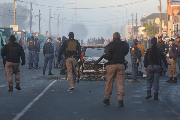 Police in Nyanga during the ongoing strike by taxi operators in Cape Town on Monday. Picture: ESA ALEXANDER/REUTERS