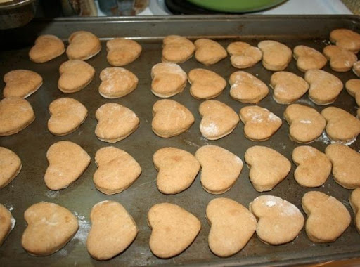 I made three cookie sheets of these from this one recipe. You can make these cookies the way the recipe calls for or do as I did and just roll them out and cut into any shape you want. the smaller the more you get.