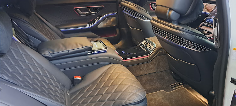 Diamond-stitched leather, plush carpets and ambient lighting create a suitably upmarket feel, and there's no shortage of rear leg room. Picture: DENIS DROPPA