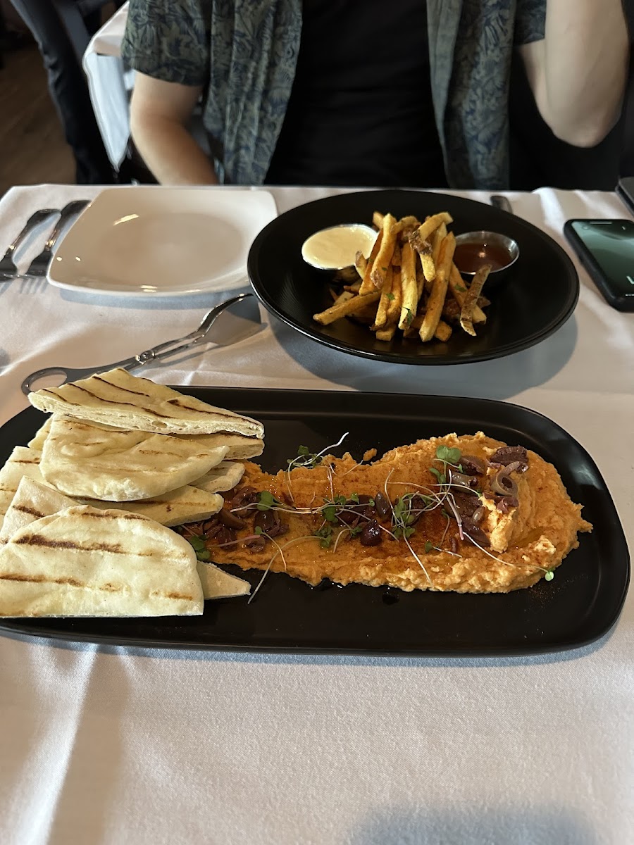 76er fries and hummus plate