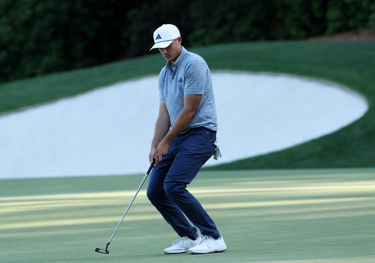 Sweden's Ludvig Aberg reacts after missing an eagle putt on the 13th green during the final round of The Masters at Augusta National Golf Club on April 14, 2024