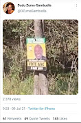 A screengrab of a video, purportedly posted on Duduzile Zuma-Sambudla's Twitter account, in which an unknown person fires shots at an election poster featuring President Cyril Ramaphosa's face.