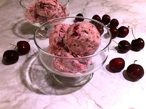 Two bowls of black cherry ice cream to enjoy on a hot summer day.