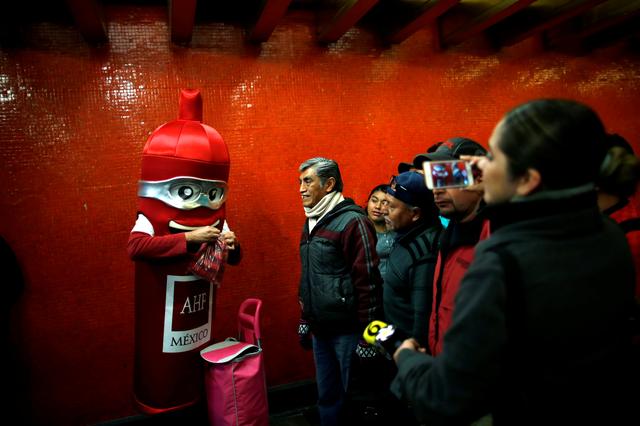 Residents in Mexico's sprawling capital were encouraged to play it safe on Valentine's Day, as 100,000 condoms were distributed across the city's metro stations on Thursday in the run up to the annual love fest.
