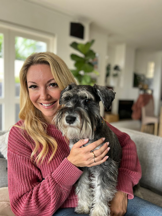 Radio personality Bailey Georgiades with her Schnauzer.